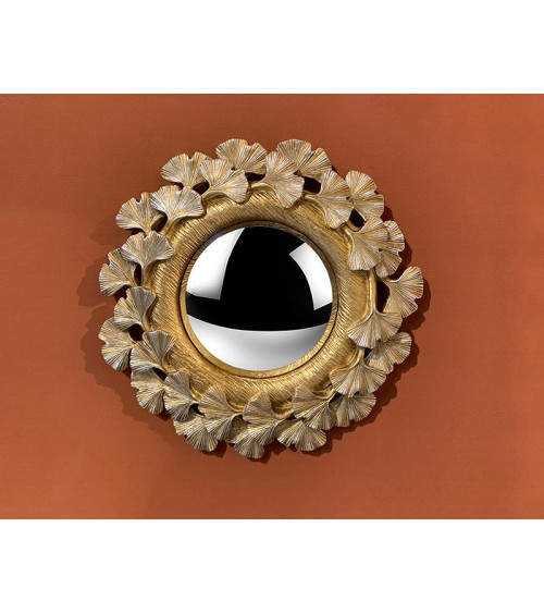 Miroir convexe couronne doré sur fond brun, décoration murale luxueuse, miroir style feuille d'or, ambiance chic