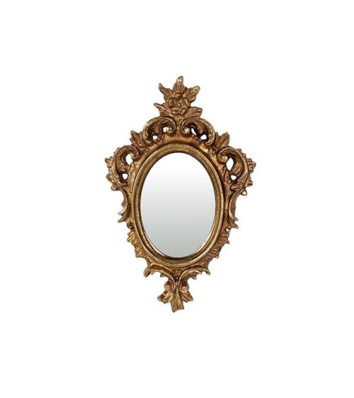 gros plan d'un miroir ovale  avec un cadre doré ancien orné de motifs rococo, sur fond blanc.