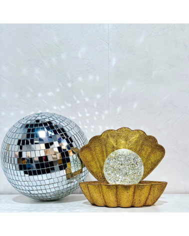 lampe coquillage dorée à paillettes avec une boule disco