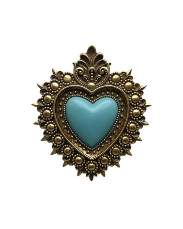 Décoration murale ex-voto en résine dorée avec cœur central bleu turquoise.