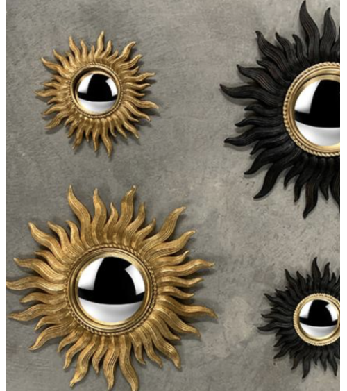 composition miroirs soleil dorés décoration murale tendance intérieur chic