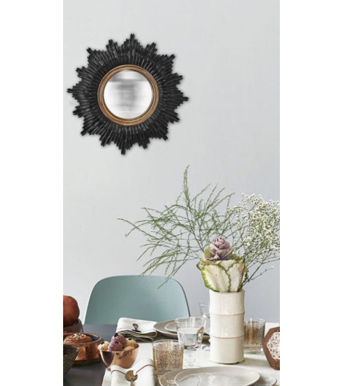 miroir soleil noir et doré dans décoration intérieure chic mur salon