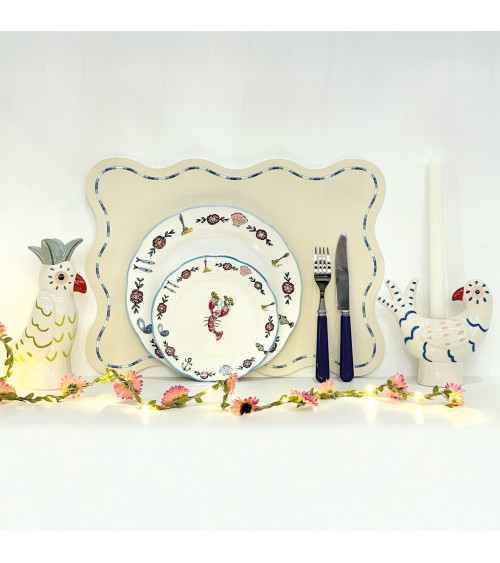 assiettes motif crustacés décoration table ambiance marine chic