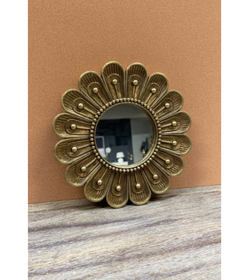 Petit miroir fleur doré en décoration murale