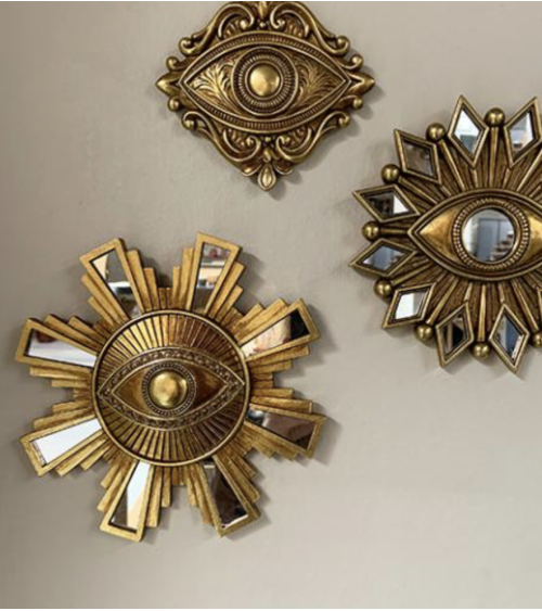 Miroir œil doré 17 cm dans une composition murale de miroirs