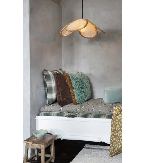 Housse de coussin chocolat en velours sur banquette
